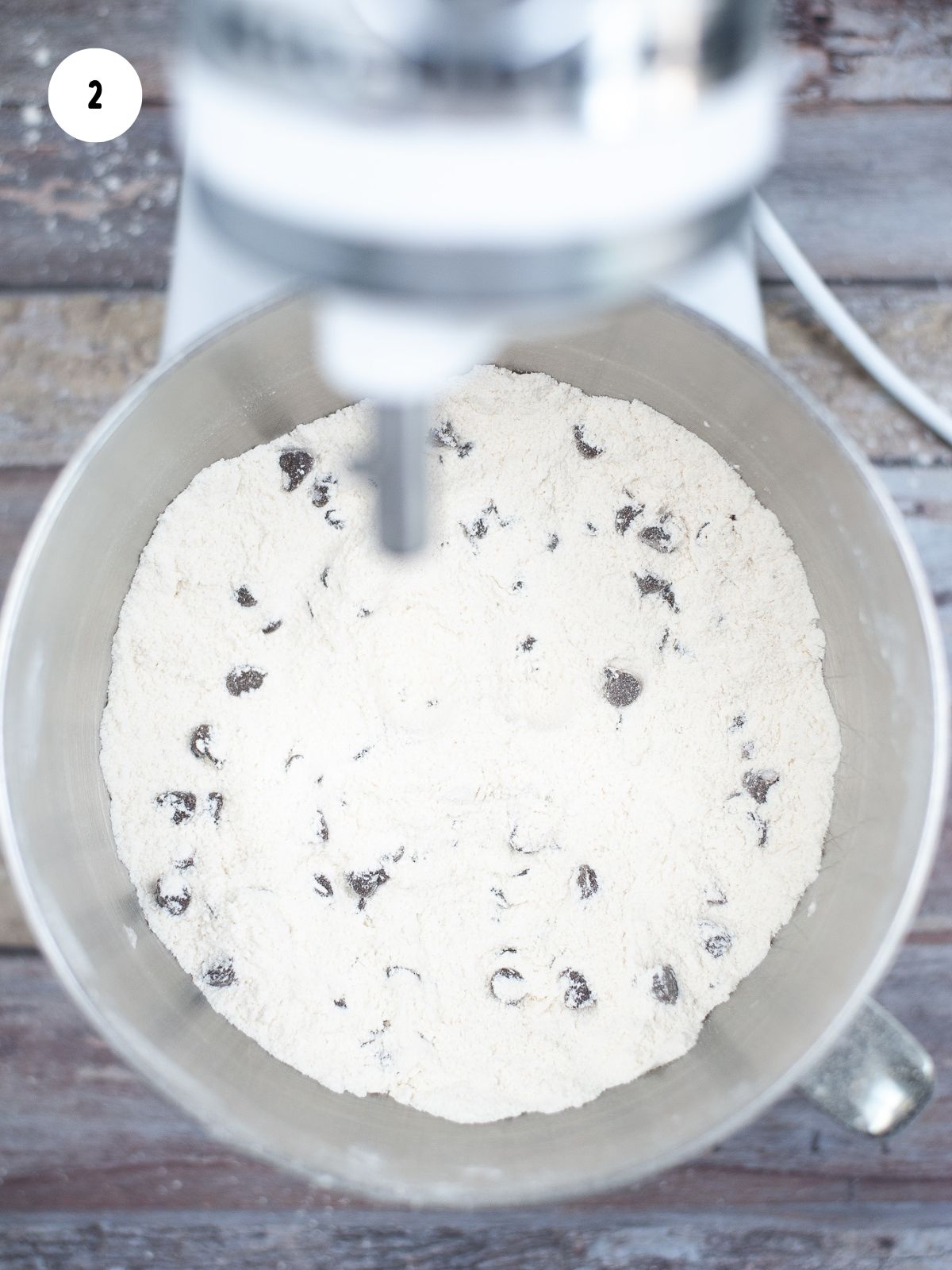 Chocolate chips added to mixing bowl