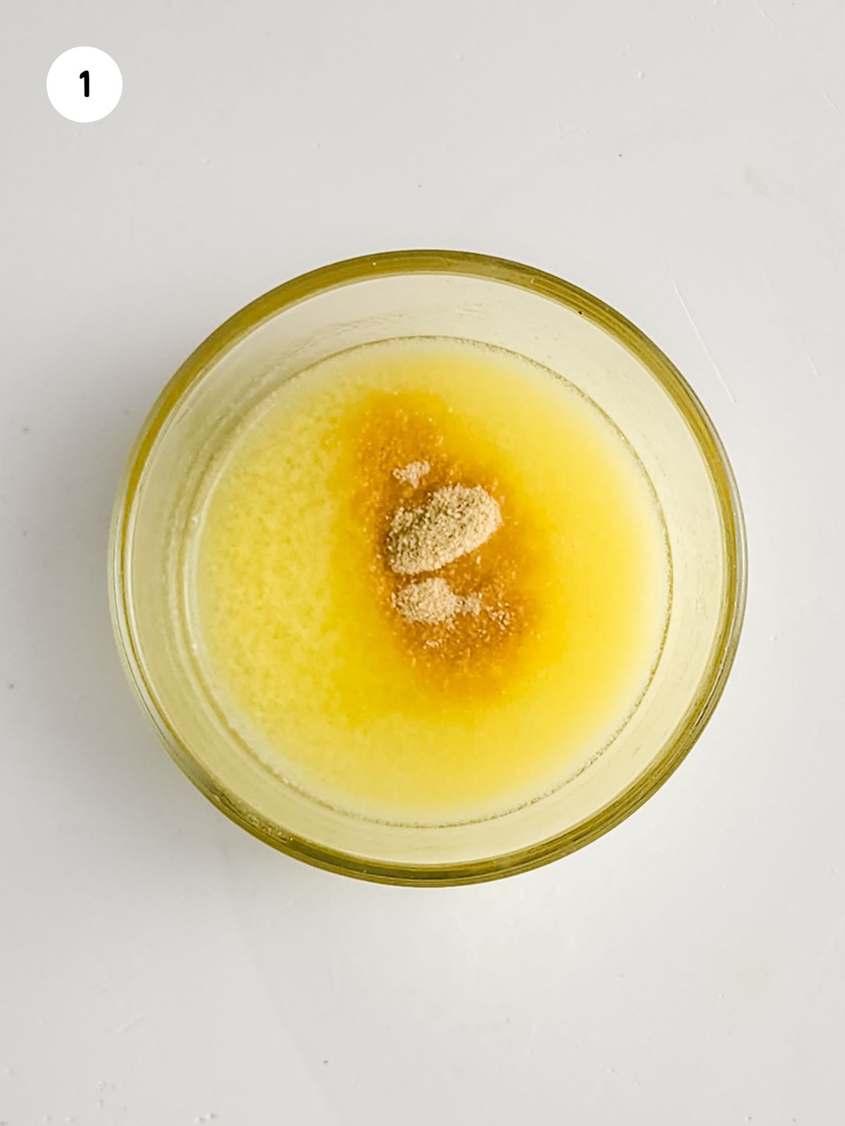 Add garlic powder to melted butter