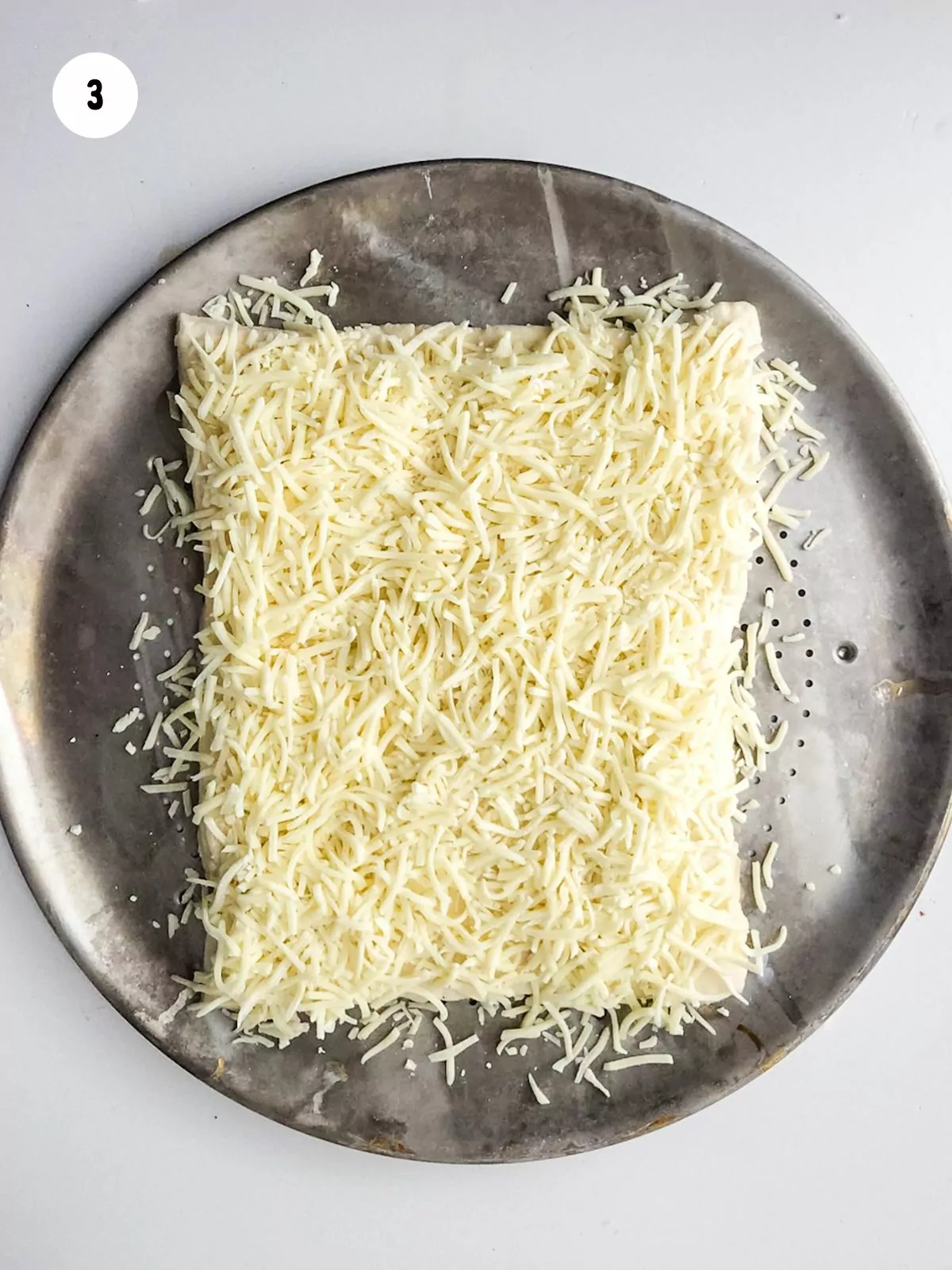 Add mozzarella and parmesan cheese
