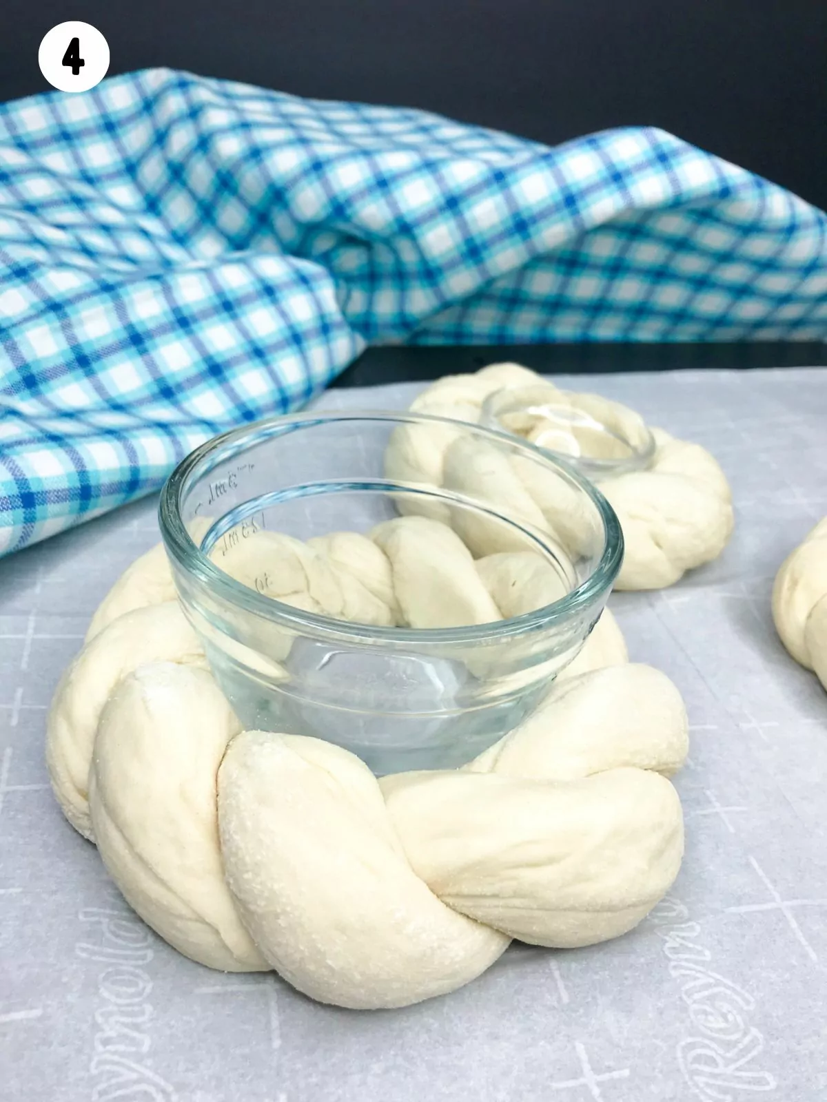 raw dough rings with glass bowls in the center.