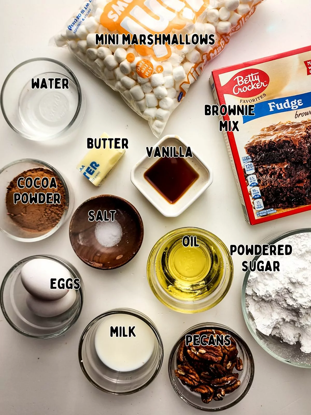 ingredients for brownies with marshmallows and pecans.