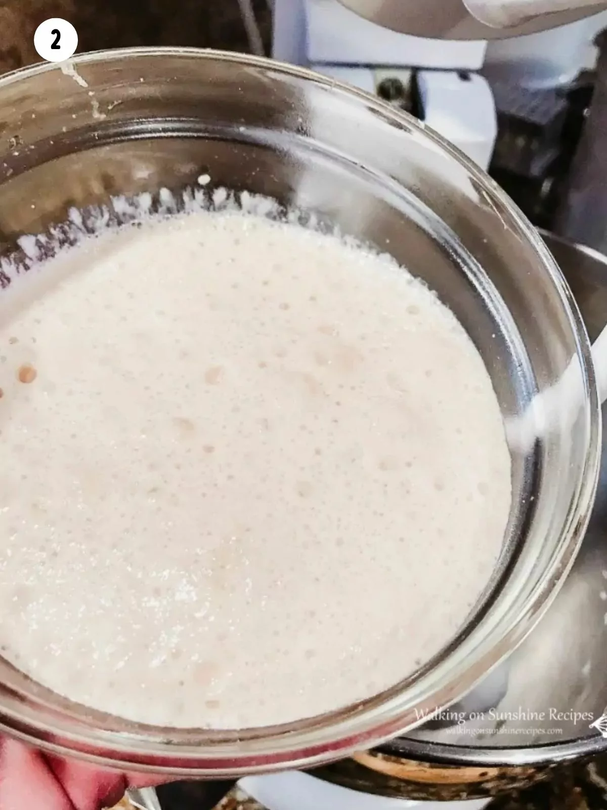 Yeast added to mixing bowl.