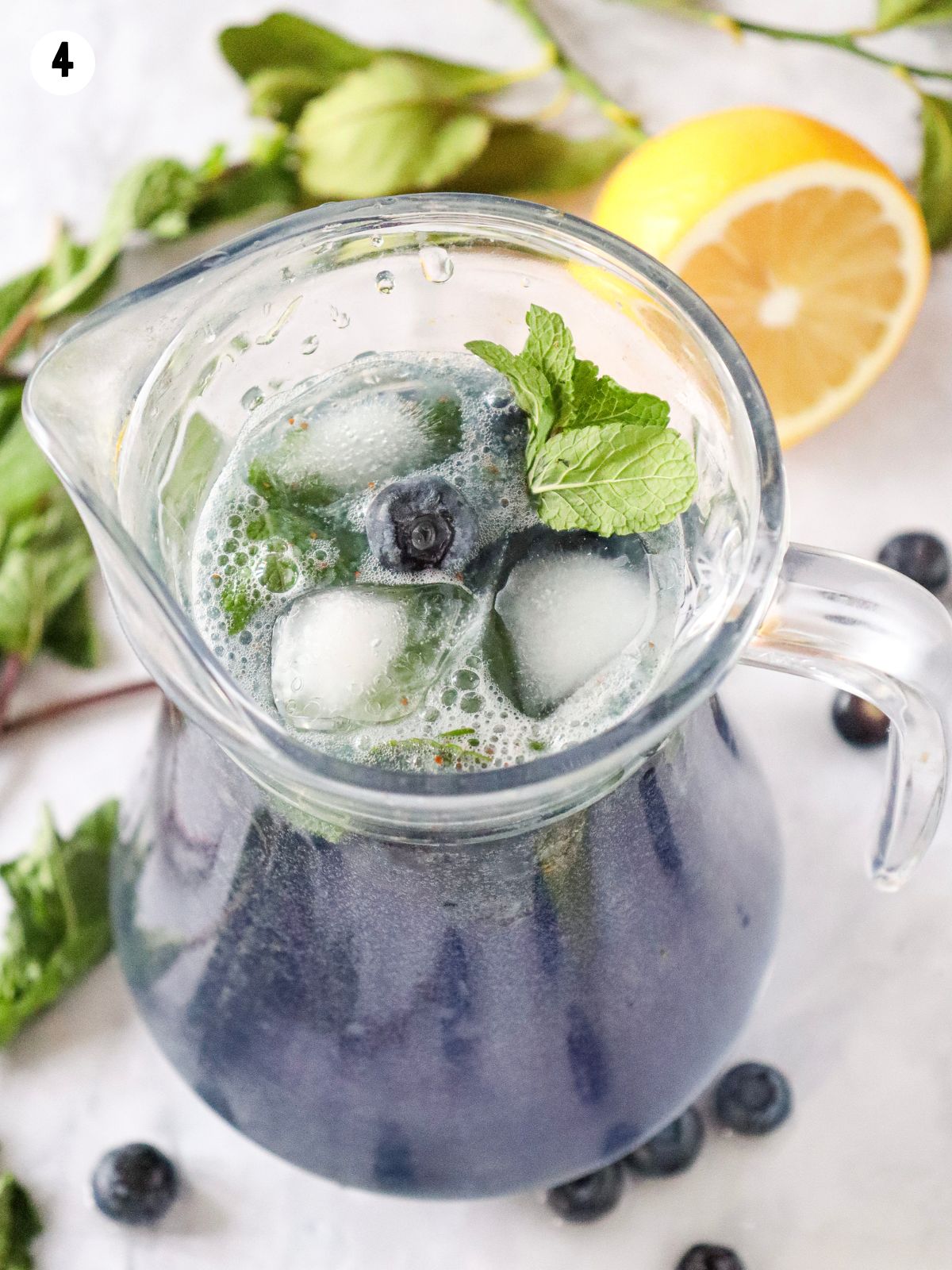 pitcher of blueberry mocktail.