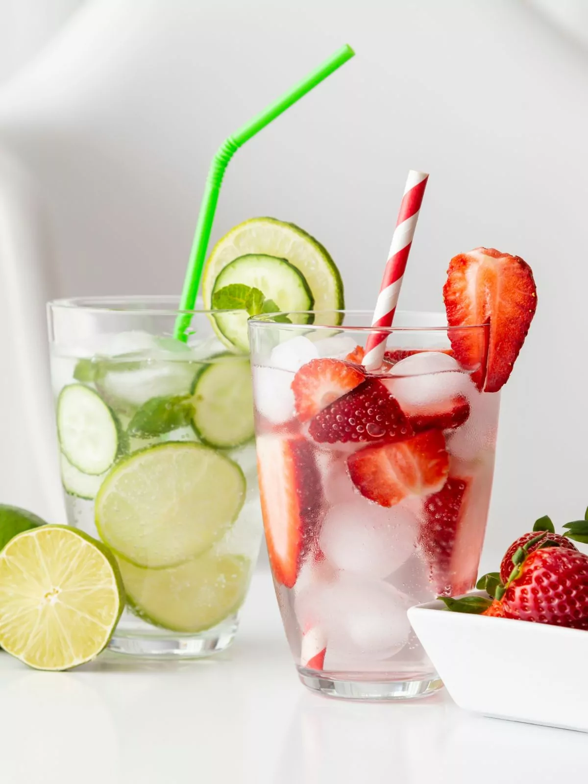 healthy infused water with strawberries and lime.