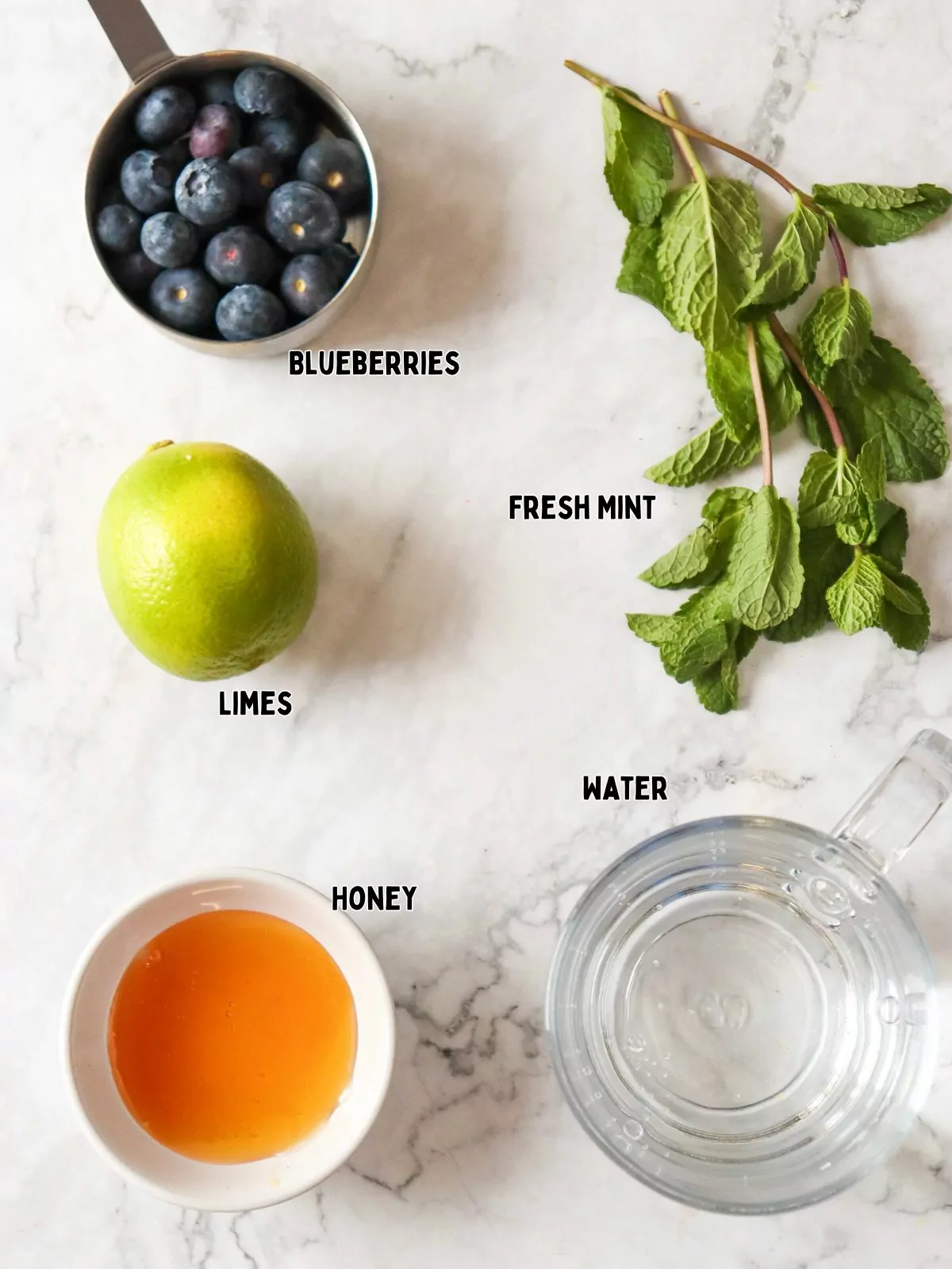ingredients for blueberry mocktail with lime.