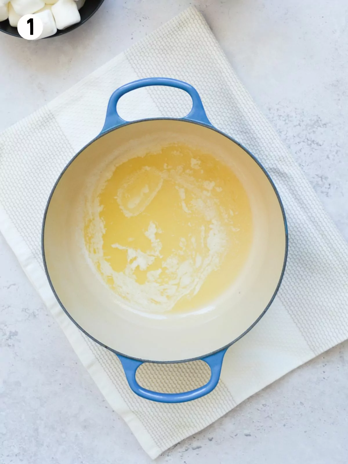 melted butter in cast iron pan.