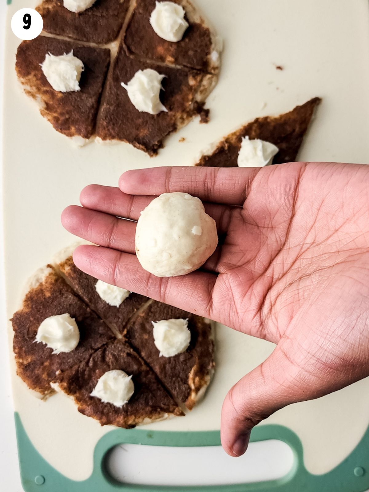 closeup of Pillsbury Grands biscuits rolled into balls.
