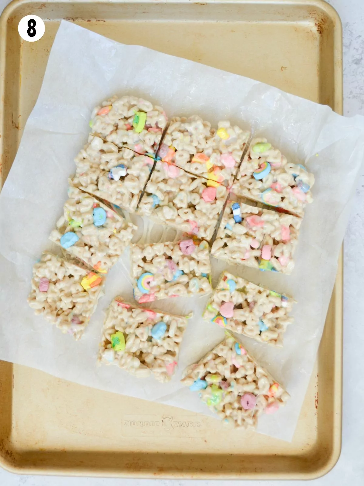 sliced cereal marshmallow bars made with Lucky Charms cereal.