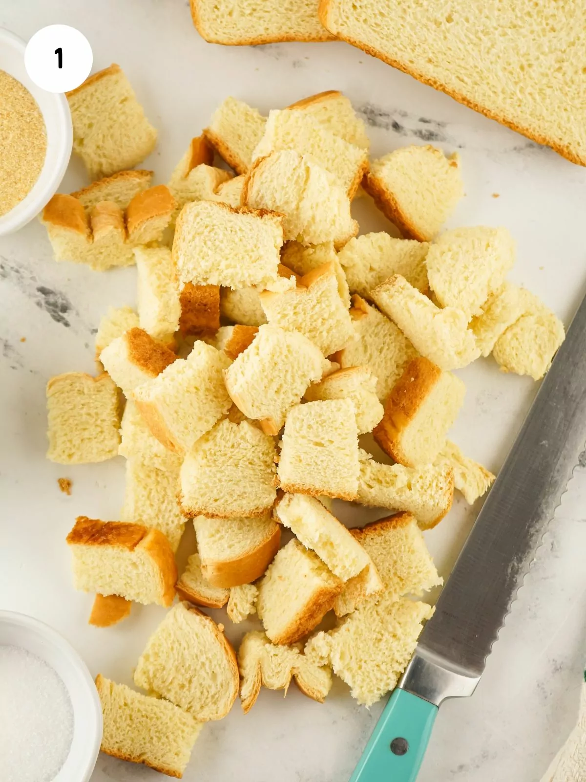 bread cubes with serrated knife.