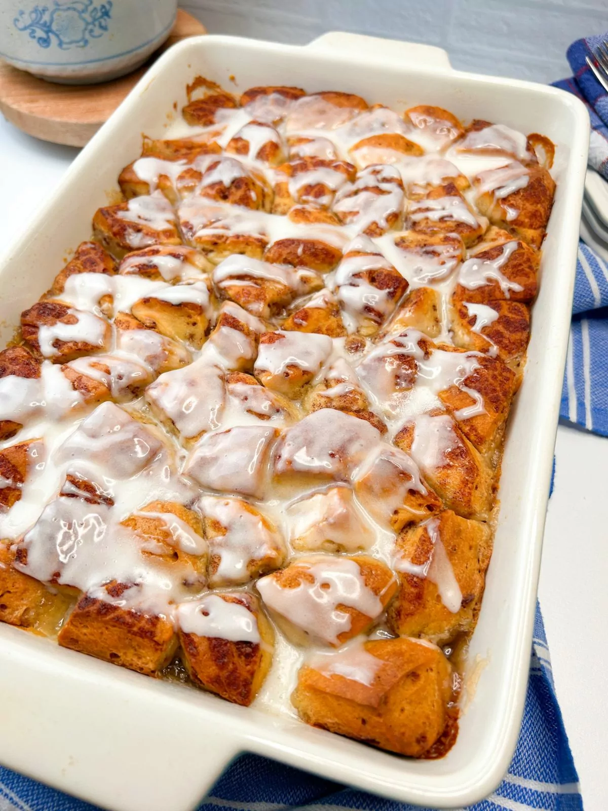 baked and frosting cinnamon roll casserole.