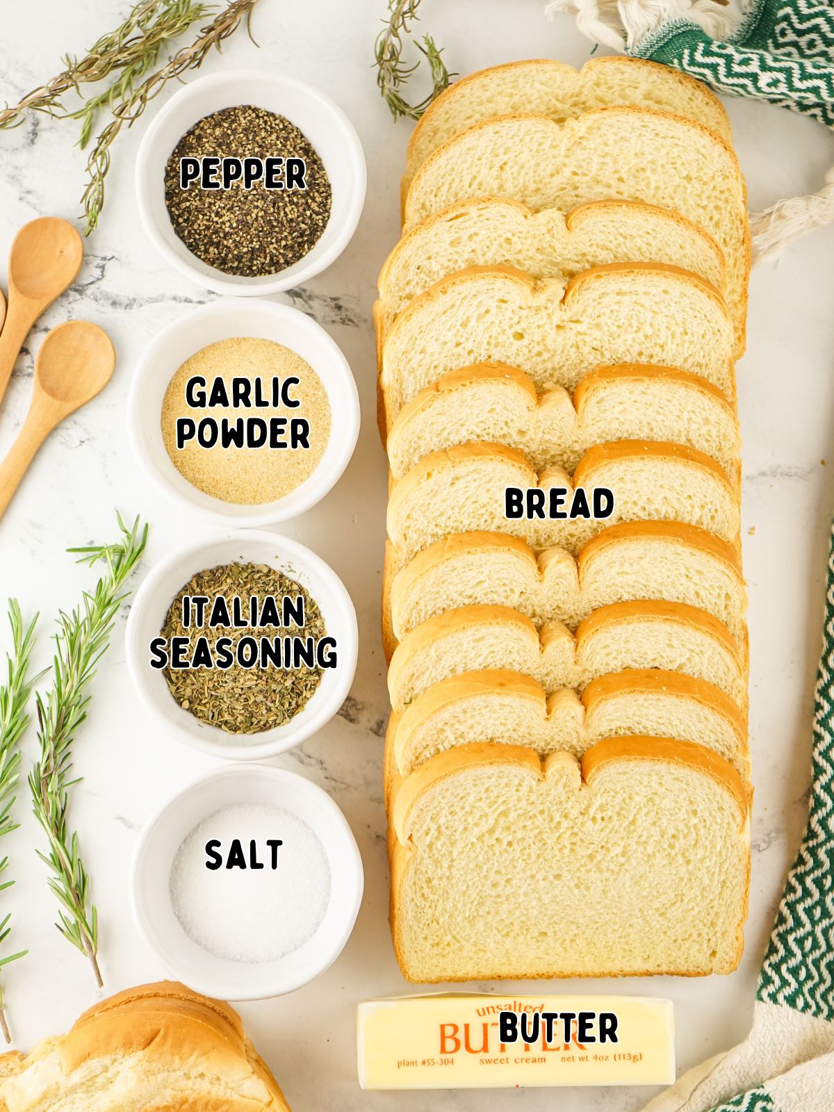 ingredients to make homemade croutons including bread, butter, and herbs.