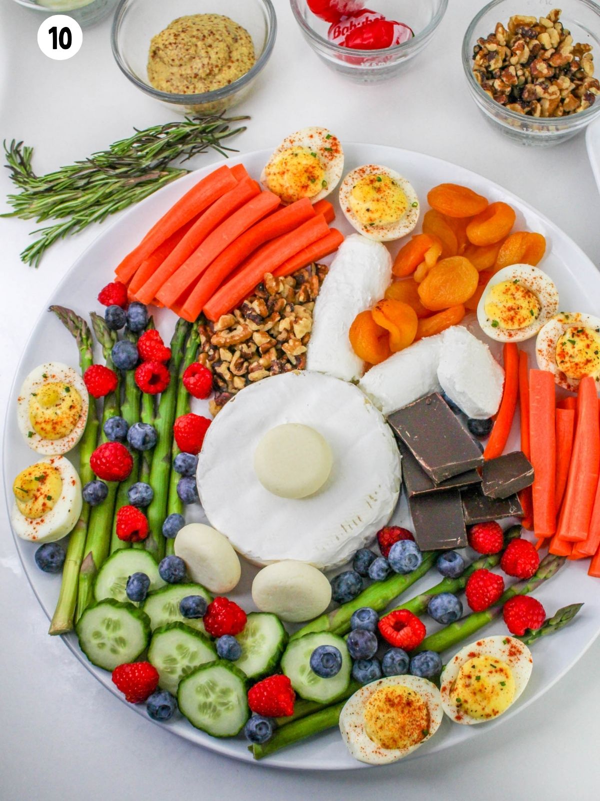 charcuterie board with filler, nuts and candy.