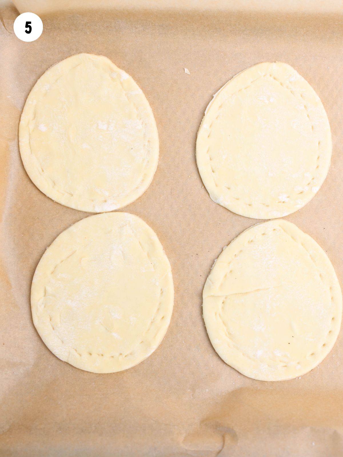 puff pastry with fork marks.