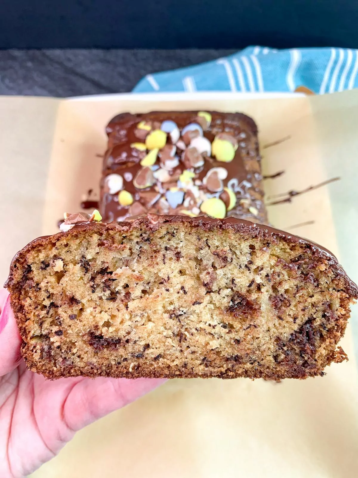 Slice of banana bread studded with leftover Easter candy.