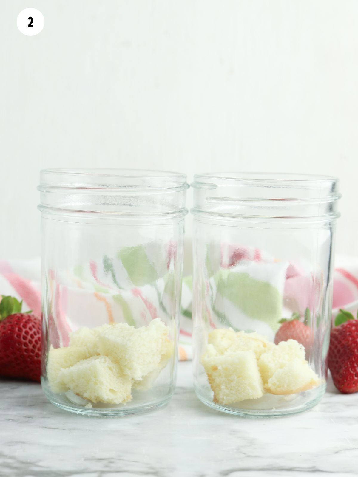 pieces of pound cake in mason jars.