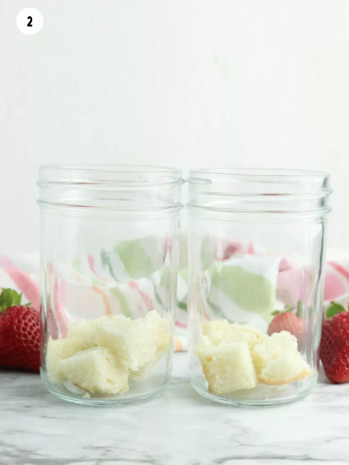 pieces of pound cake in mason jars.