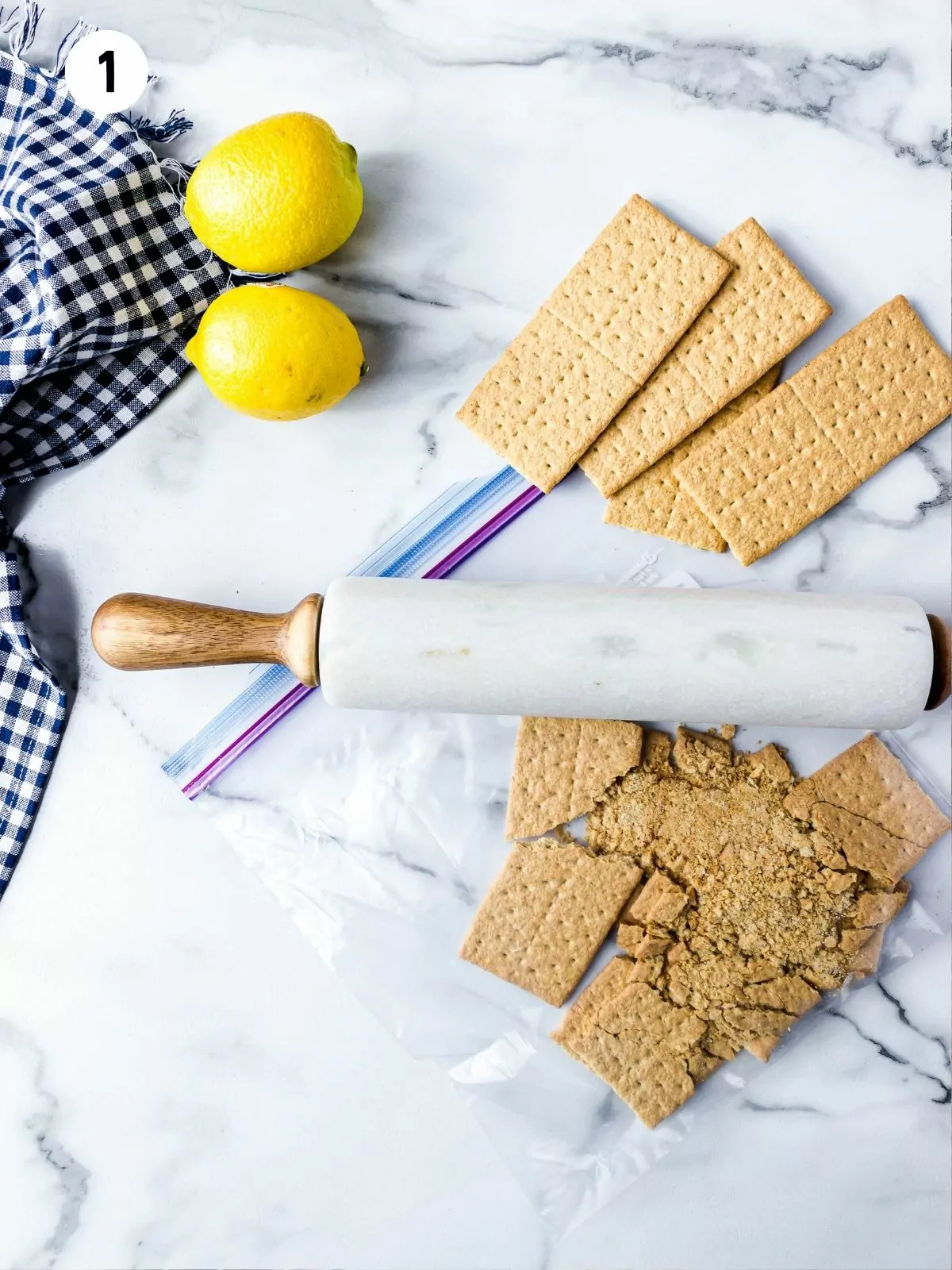 crush graham crackers using a rolling pin.