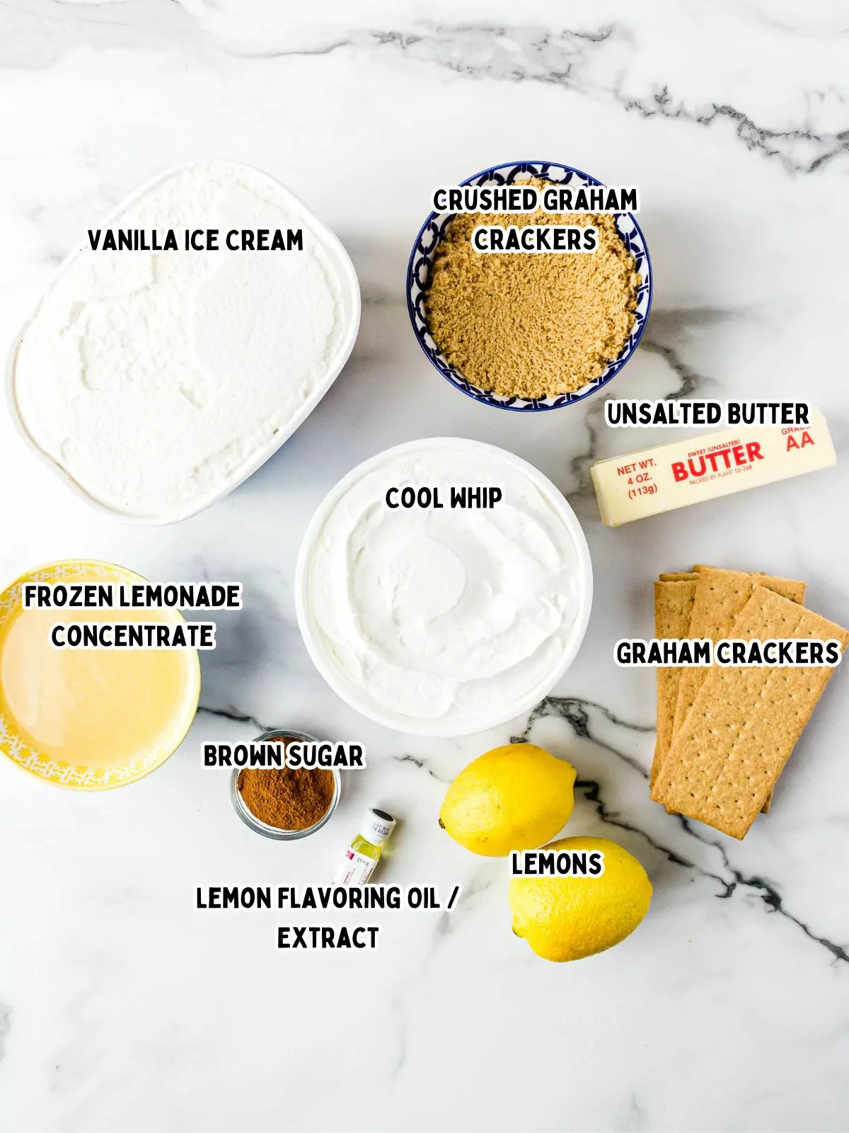 Frozen dessert ingredients, lemons, whipped topping, graham cracker crumbs.