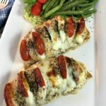 Featured photo chicken with cheese and tomato.