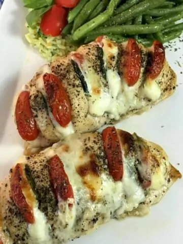 Featured photo chicken with cheese and tomato.