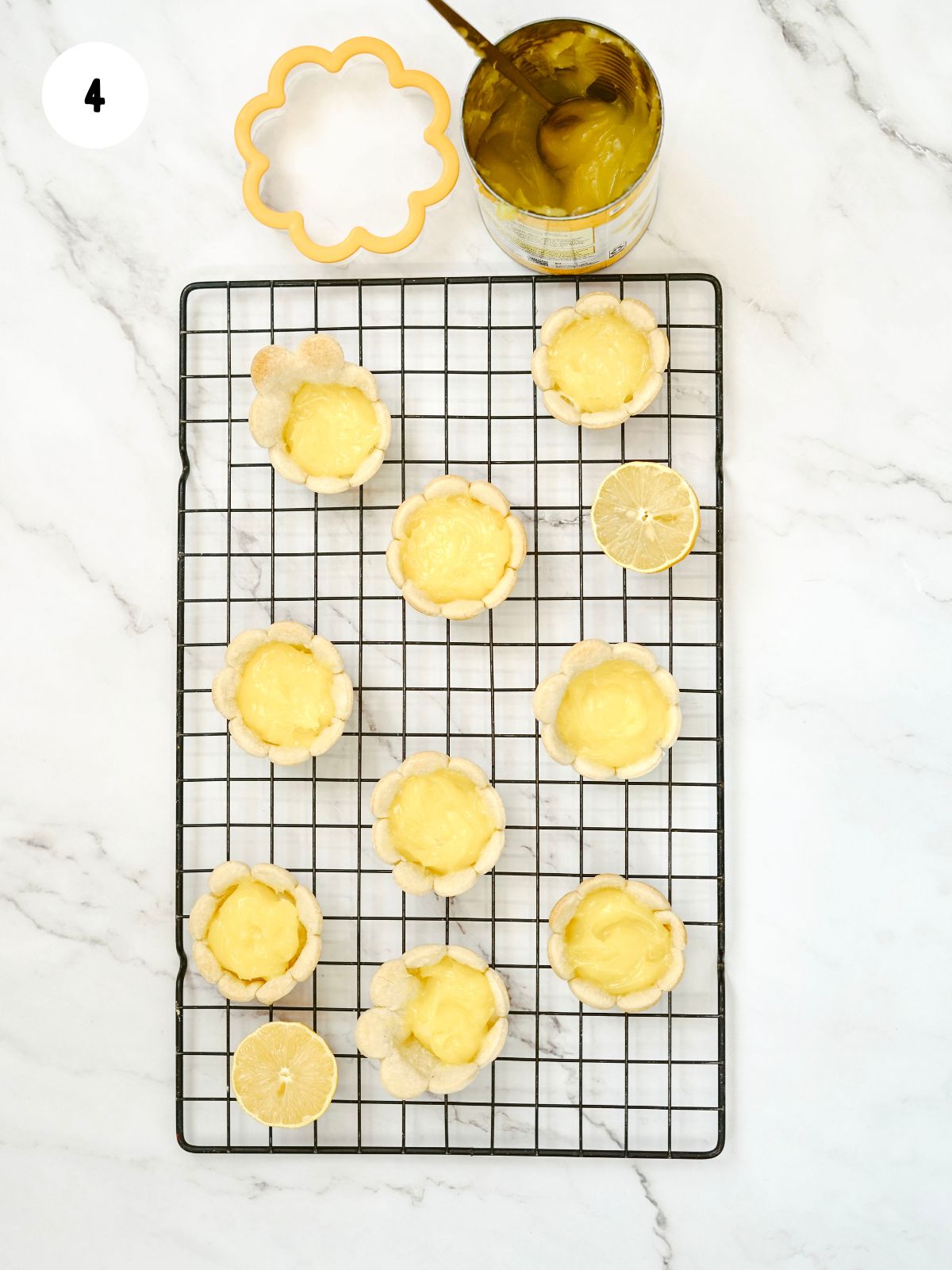pie filling added to the baked flower pie tarts