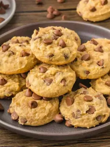 gray plate of Chocolate Chip Pudding Cookies piled up
