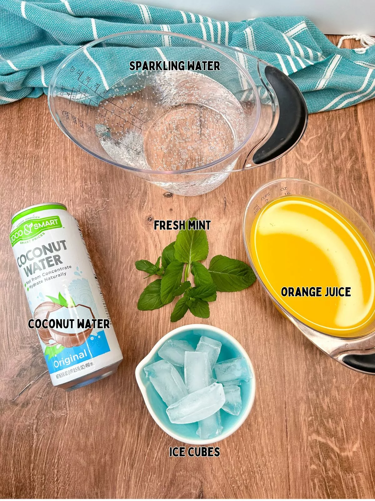ingredients to make coconut water and orange juice drink