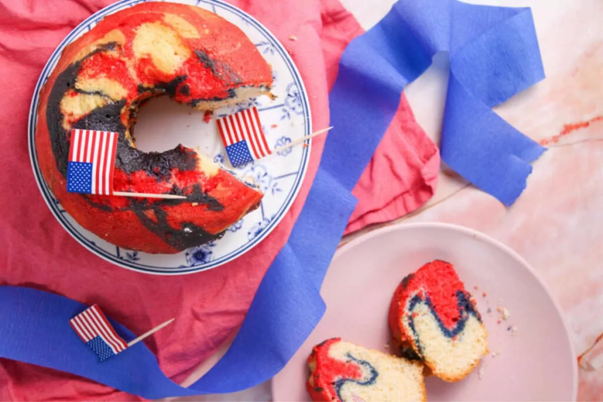 Patriotic Bundt cake with a flag toothpick toppers.