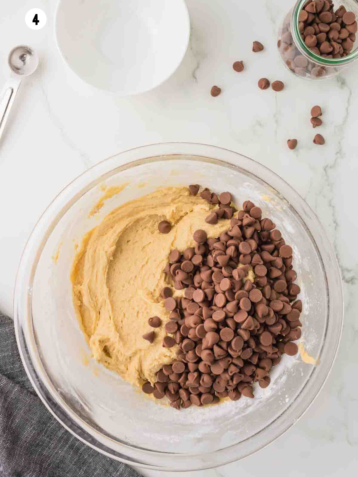 Add chocolate chips to the cookie dough