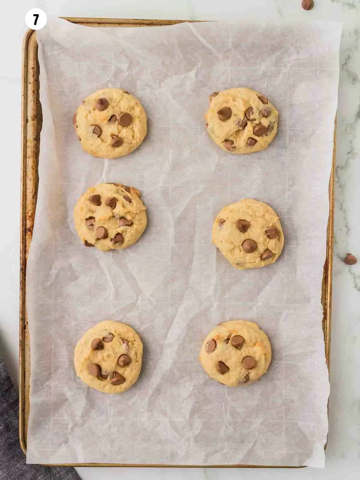 baked cookies on a parchment line baking sheet