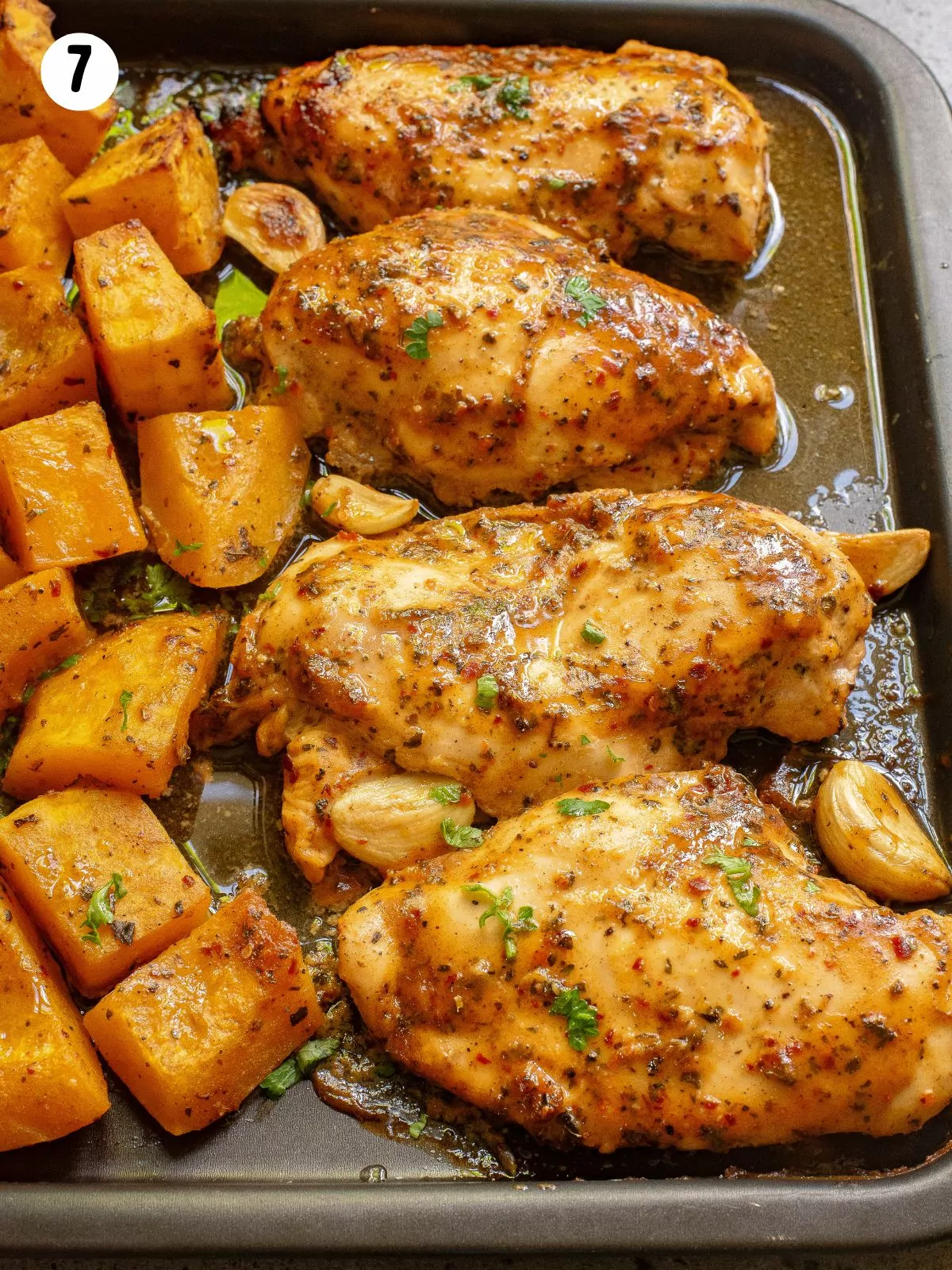baked chicken on sheet pan.