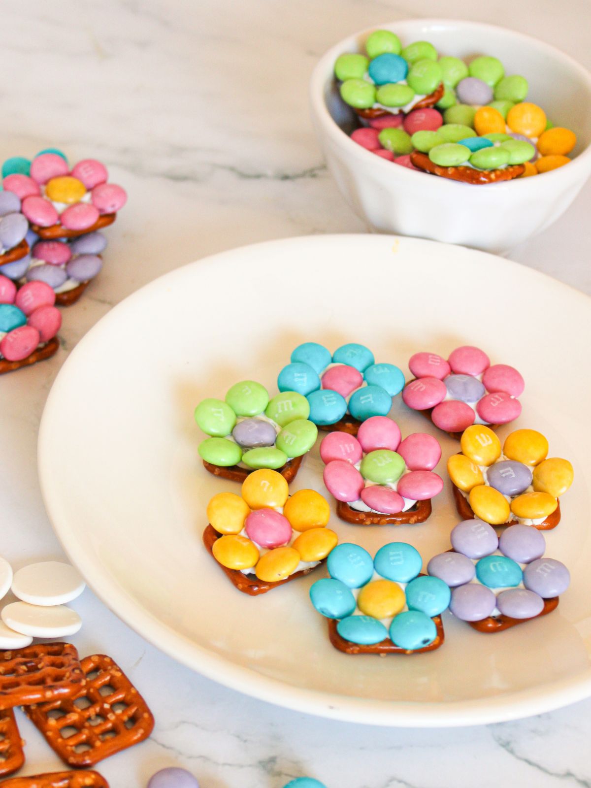 pretzel candy on white plate.