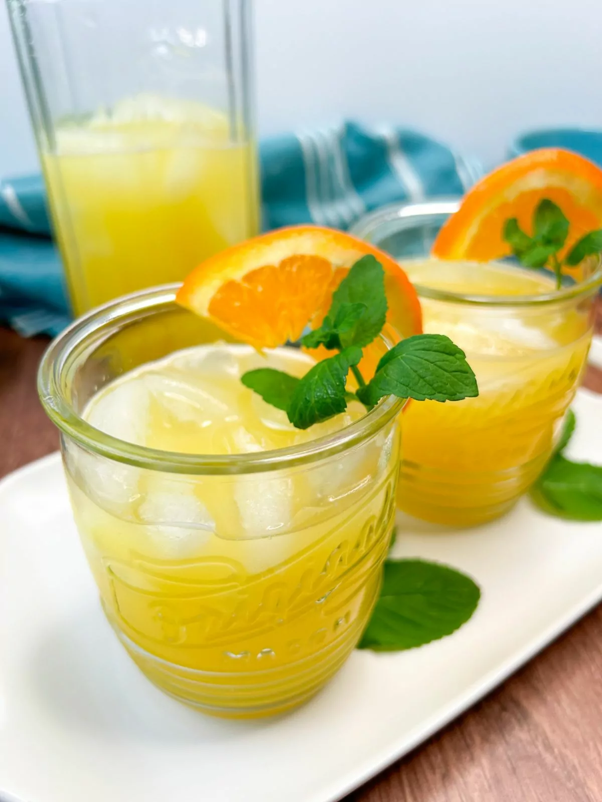 coconut water and orange juice drink served