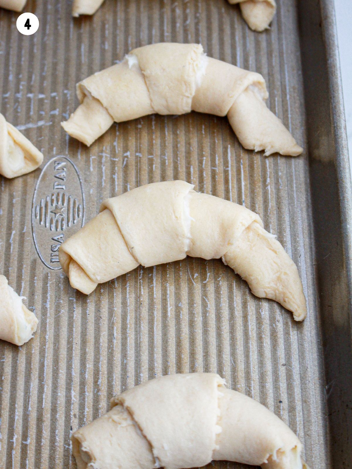 crescent rolls on baking sheet before baking.