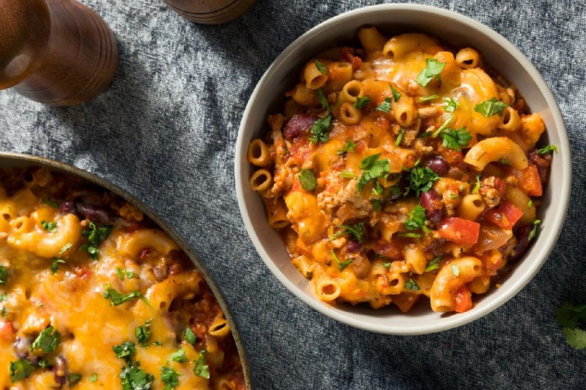 baked cheesy beef with tomatoes, pasta and cheese.
