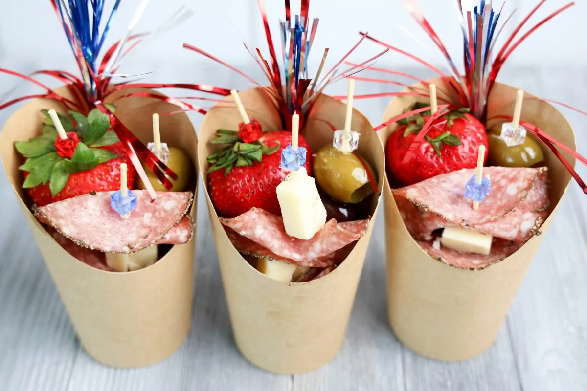 row of 3 4th of July Charcuterie Cups displayed