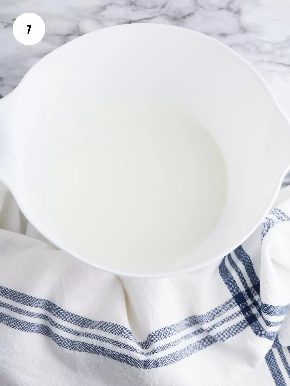 Heavy Cream and sugar in mixing bowl