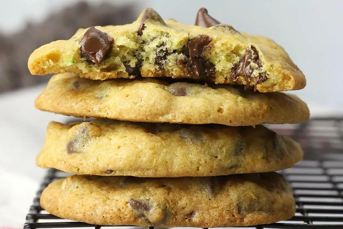 stacked chocolate chip cookies with grated zucchini in batter.