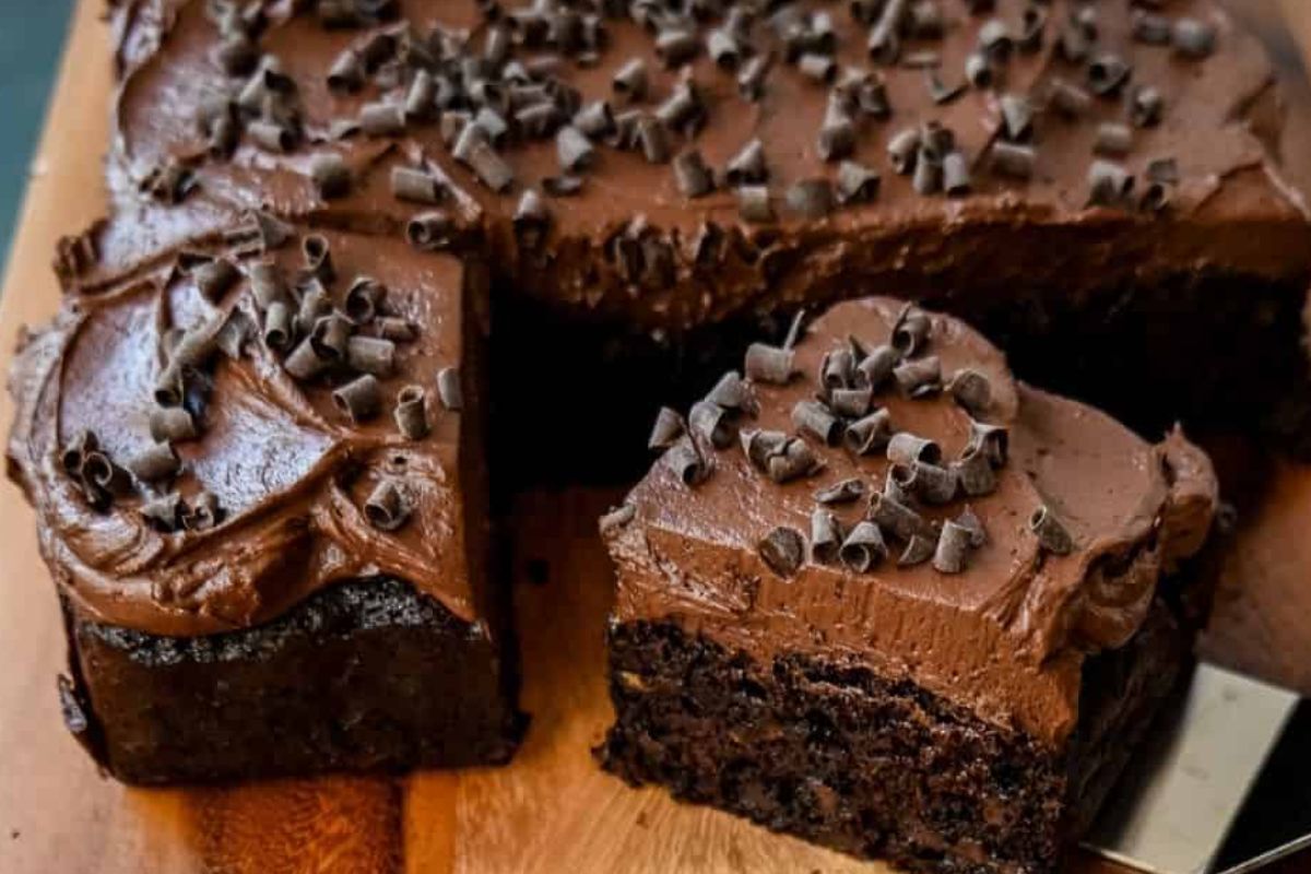 Chocolate Zucchini Cake sliced on cutting board.