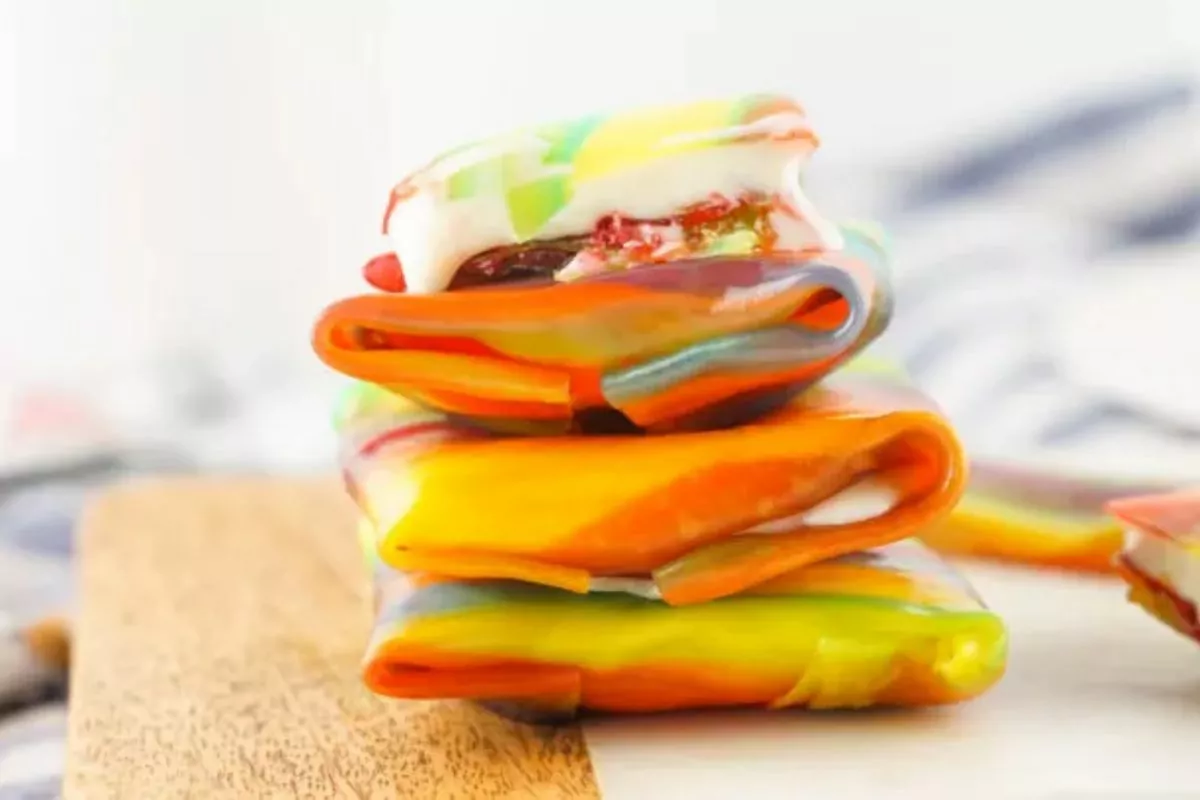 a pile of fruit roll ups filled with ice cream.