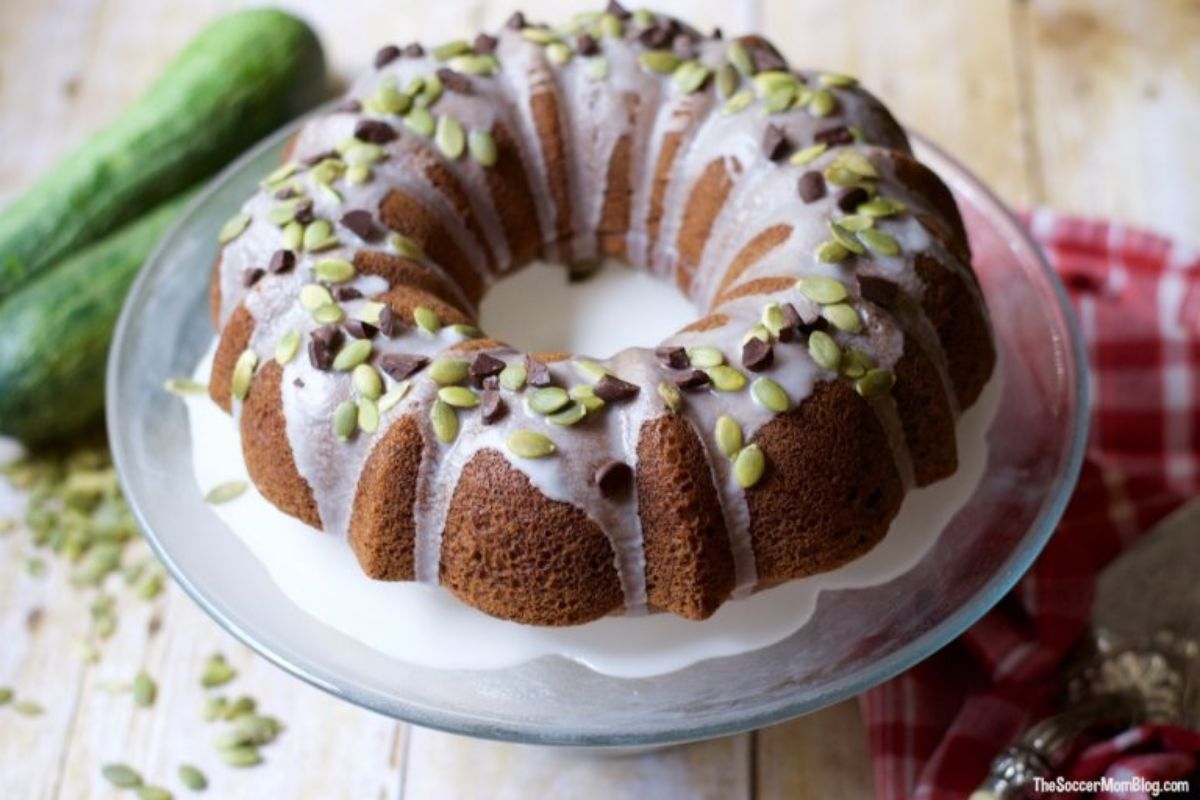 zucchini bundt cake on cake stand.
