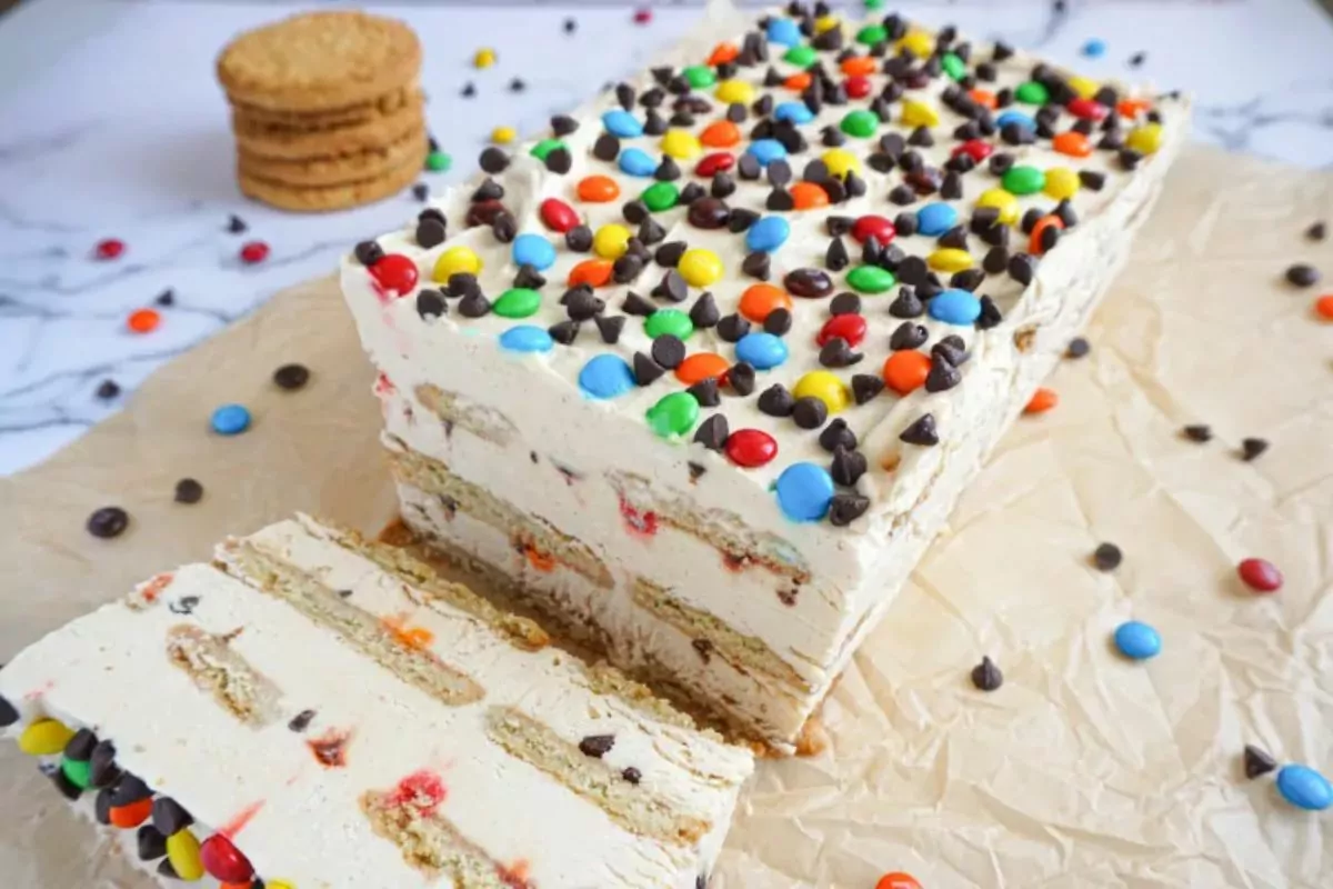 An icebox cake covered with m&m candy.