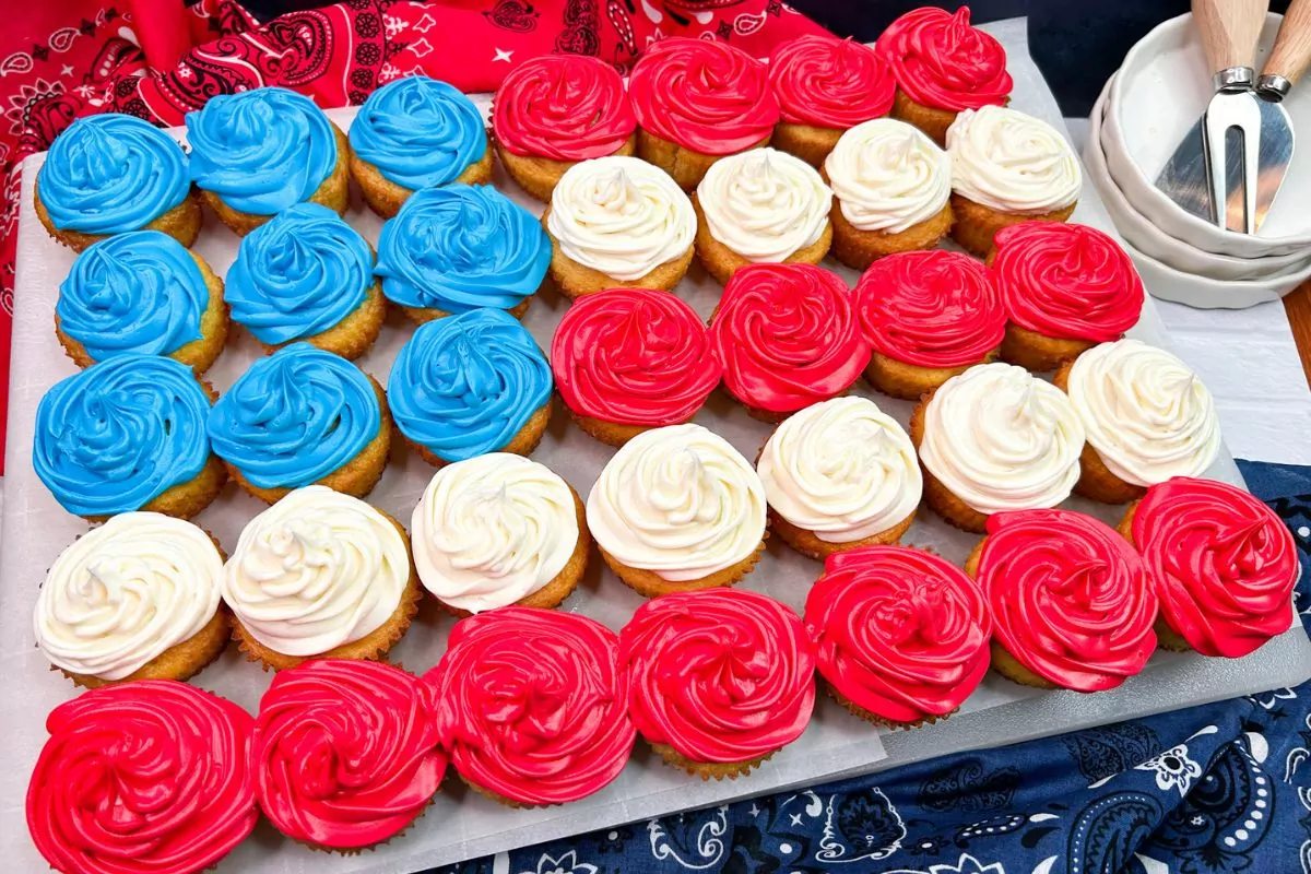 red, white and blue cupcakes in the shape of a flag.