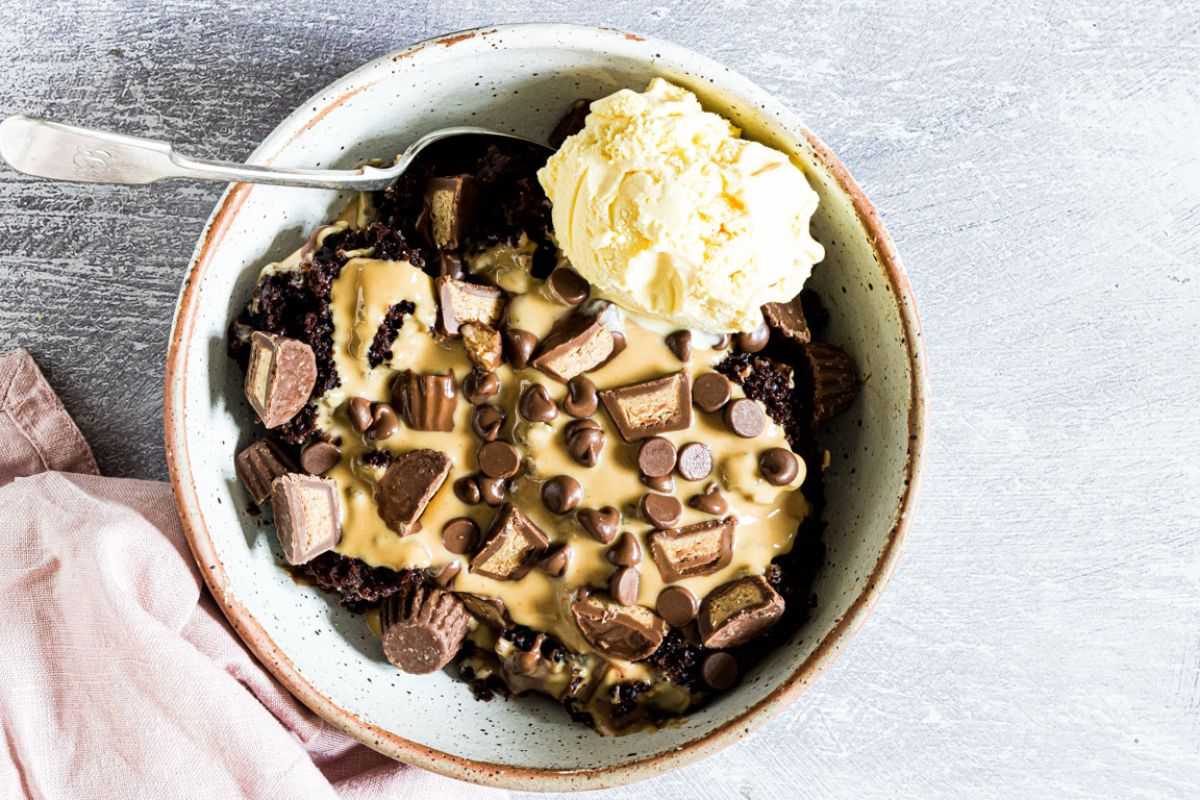 peanut butter chocolate dump cake in bowl.