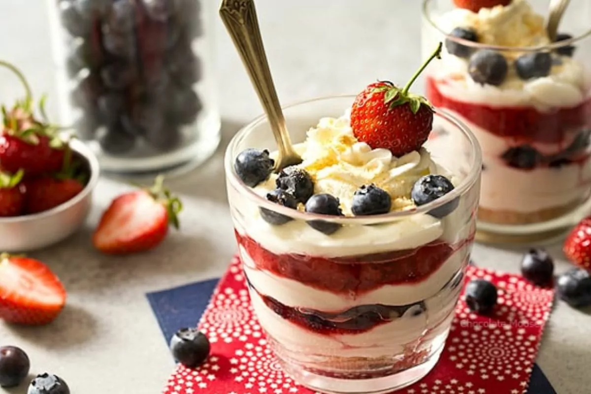 RED WHITE AND BLUE CHEESECAKE in clear glasses.
