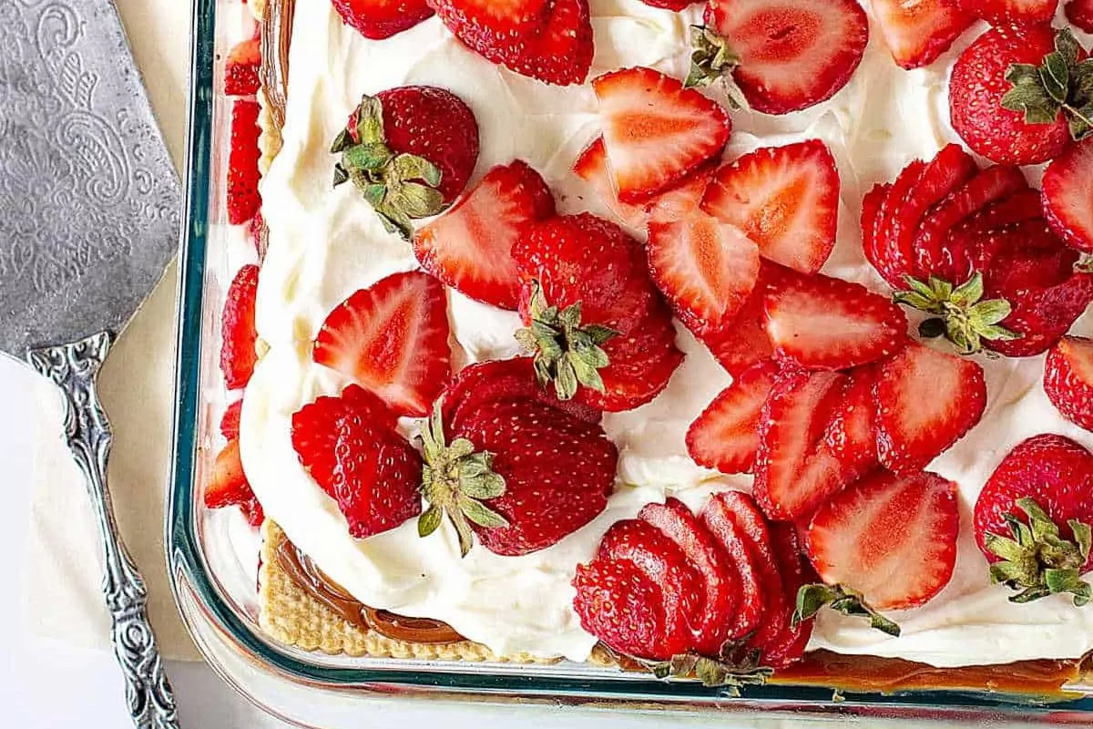 summery strawberry icebox cake in casserole dish.
