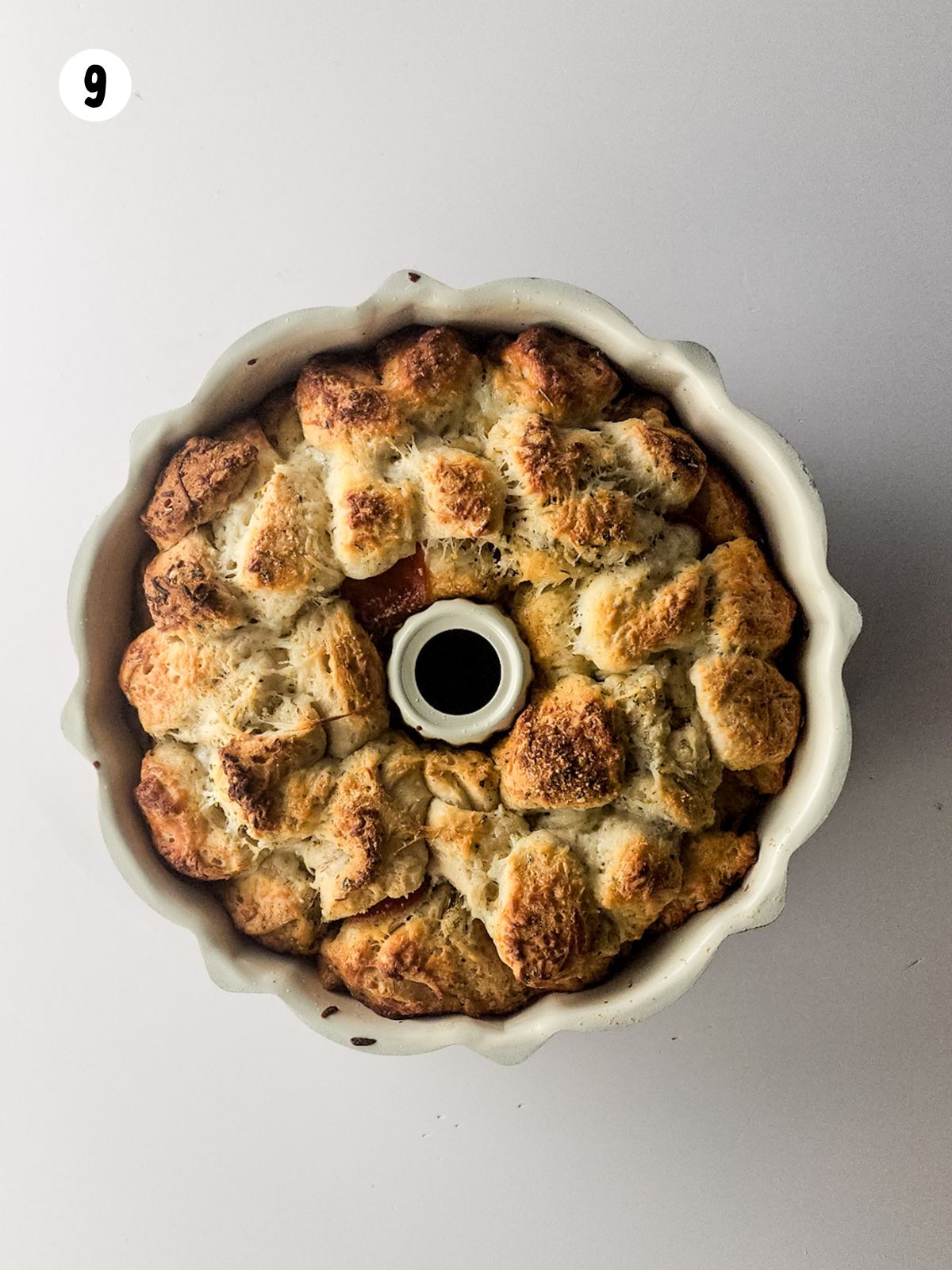 baked savory monkey bread in bundt pan.