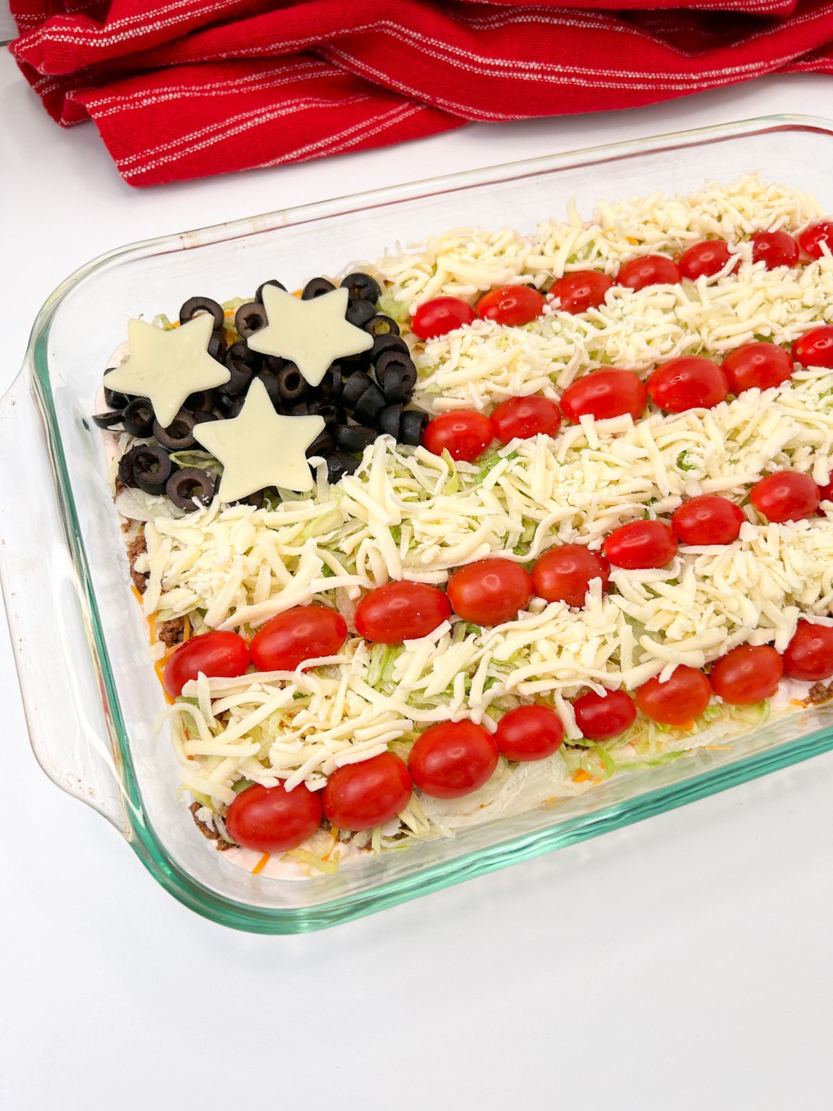 closeup of finished taco salad in casserole dish.