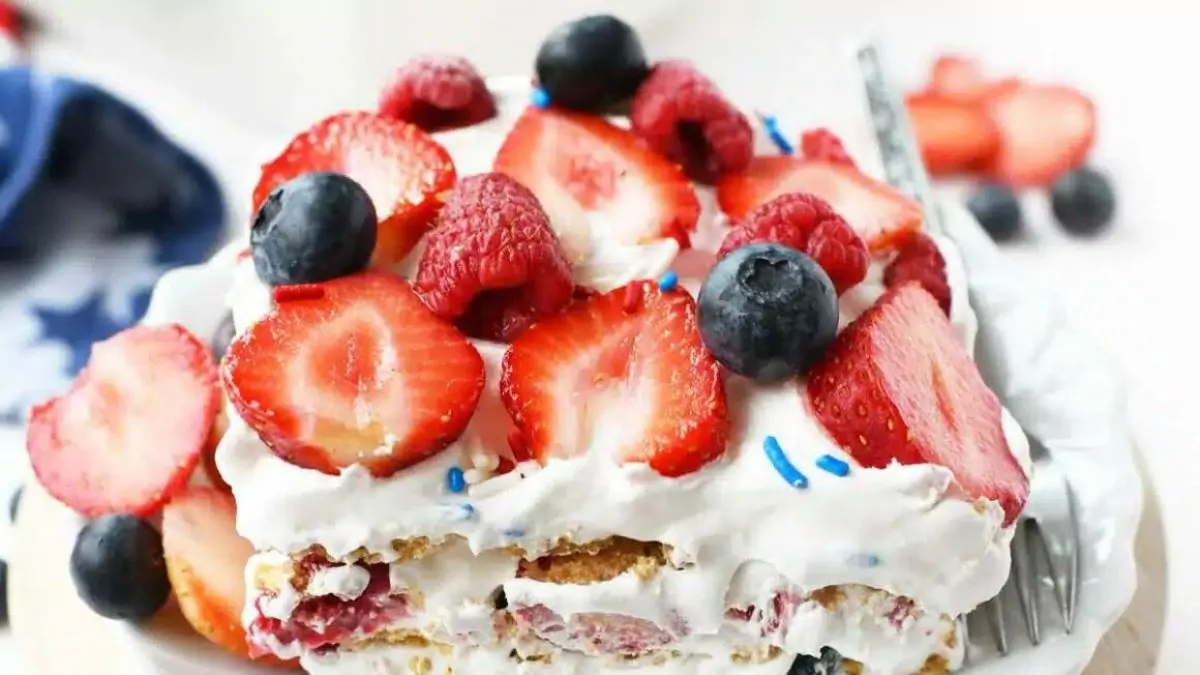 an icebox cake of graham crackers, berries and cool whip.