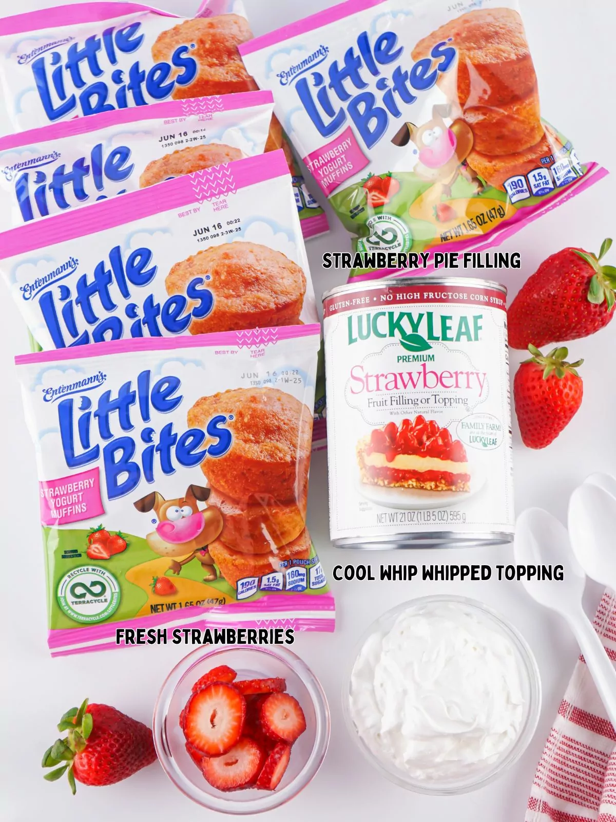 Ingredients of strawberry muffins, pie filling, Cool whip and fresh fruit.